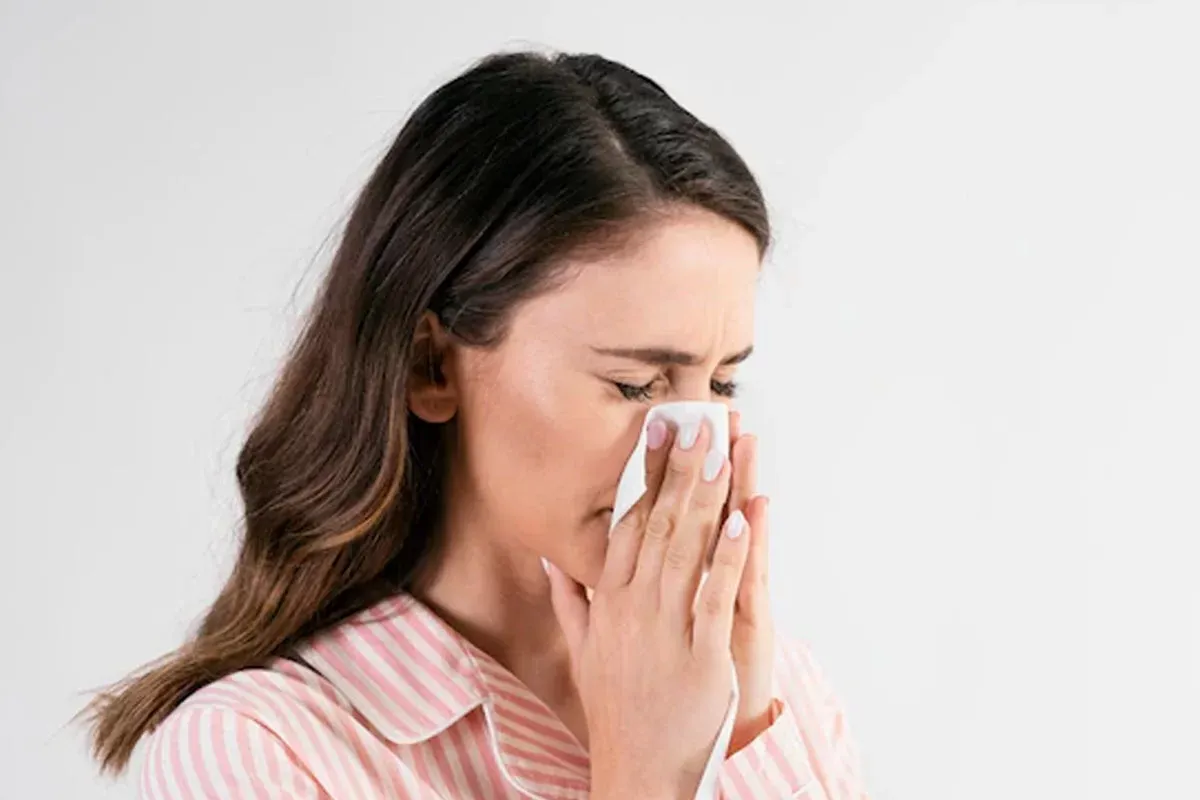 pessoa com rinite